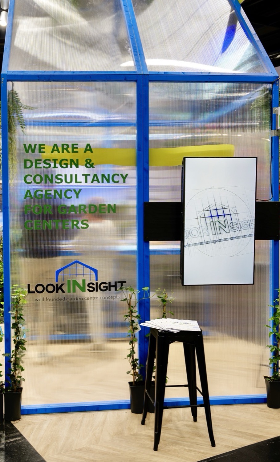 The lookINsight greenhouse stand at a European trade fair: 'We are a design & consultancy agency for garden centers'