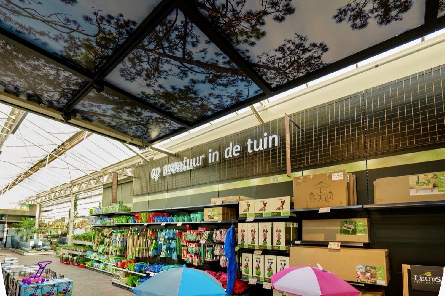 Leurs Venlo: printed ceiling panels above the garden tools department