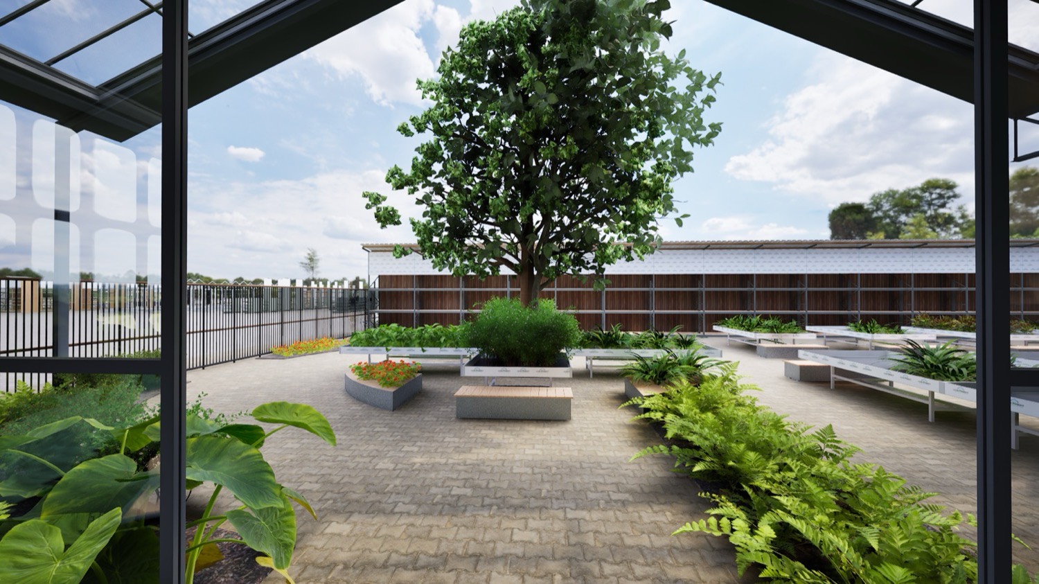 Tuinwereld Wijchen: covered courtyard with a large feature tree